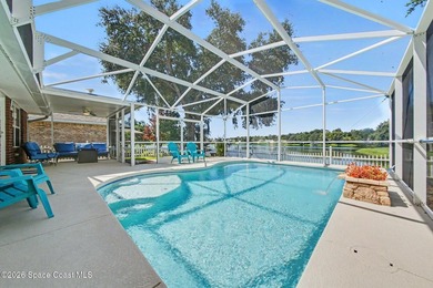 Welcome to this beautifully updated waterfront pool home located - photo 2