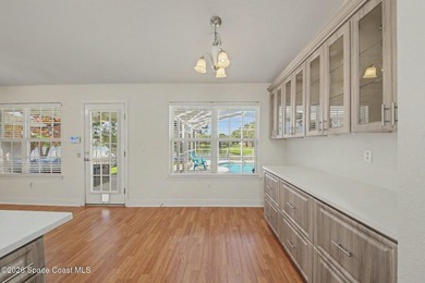 Welcome to this beautifully updated waterfront pool home located - photo 10