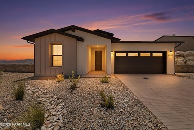 Perched on an elevated corner homesite in the highly desirable - photo 1