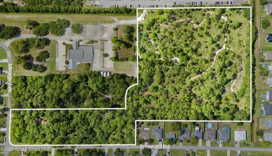 Rare opportunity to acquire +/-12.12 acres of city-served - photo 1