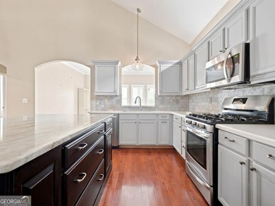 You will LOVE this updated cottage-style home in the highly - photo 11