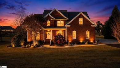 scover this stately brick home situated on the fifth hole in - photo 1