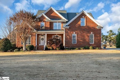 scover this stately brick home situated on the fifth hole in - photo 2