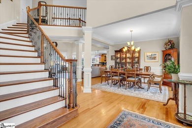 scover this stately brick home situated on the fifth hole in - photo 3