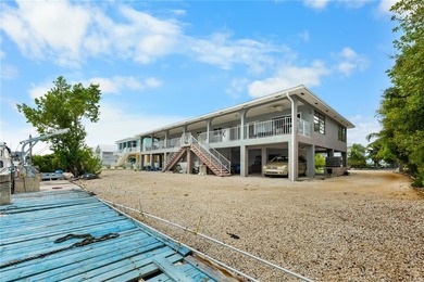 Set within Coco Plum area of Marathon, this waterfront residence - photo 33