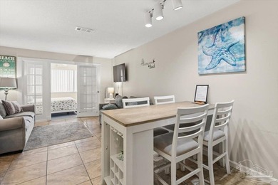 Top-floor condominium at The Palms at Sunset Harbor, just steps - photo 1