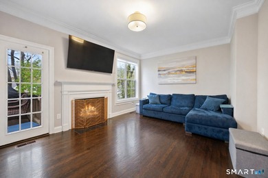 Discover this delightful colonial, tucked away on a private - photo 3