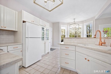 Discover this delightful colonial, tucked away on a private - photo 6