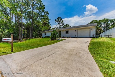 Escape the ordinary! This move-in-ready 4-bedroom, 2-bath home - photo 3