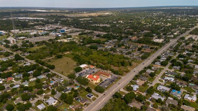 This prime 4.87-acre parcel is strategically located in a highly - photo 11