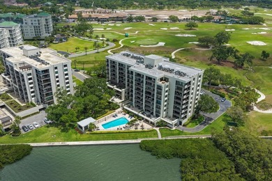 Tucked behind the guarded gates of the prestigious Belleair - photo 50