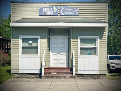 This unique 1,080 sq. ft. corner property is currently operating - photo 2