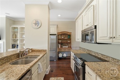 Welcome to 114 Riverfront Circle-an exceptional fully furnished