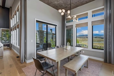Backing breathtaking water and mountain views, this stunning - photo 15