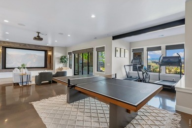 Backing breathtaking water and mountain views, this stunning - photo 41