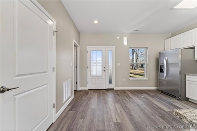 Welcome to your brand-new, move-in-ready home in Four Seasons - photo 2