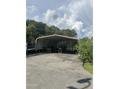 Welcome to 1.25 acres of out of town living . There are two