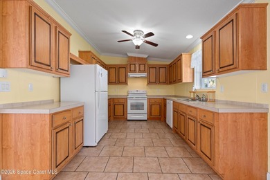 Spacious four-bedroom, three-bath home featuring a versatile - photo 7