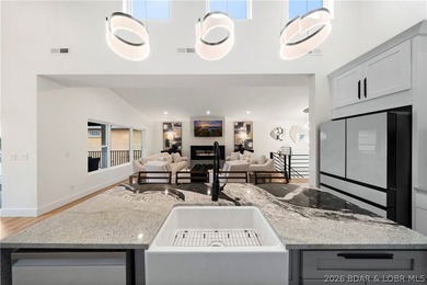 Experience luxury lakefront living in this fully furnished - photo 14