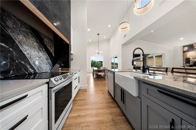 Experience luxury lakefront living in this fully furnished - photo 15