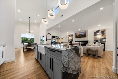 Experience luxury lakefront living in this fully furnished - photo 16