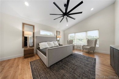 Experience luxury lakefront living in this fully furnished - photo 19