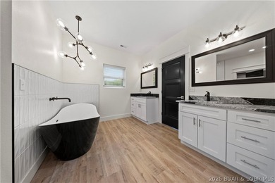 Experience luxury lakefront living in this fully furnished - photo 22