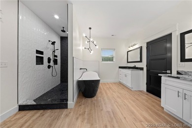 Experience luxury lakefront living in this fully furnished - photo 23