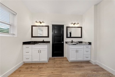 Experience luxury lakefront living in this fully furnished - photo 26