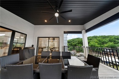 Experience luxury lakefront living in this fully furnished - photo 30