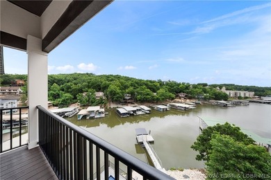 Experience luxury lakefront living in this fully furnished - photo 31