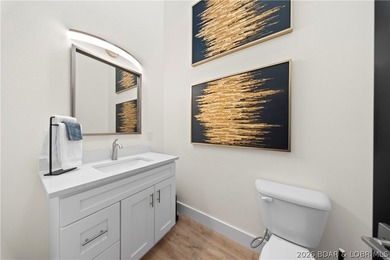 Experience luxury lakefront living in this fully furnished - photo 33