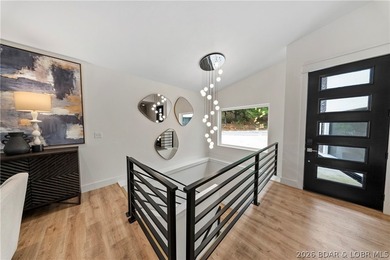 Experience luxury lakefront living in this fully furnished - photo 34