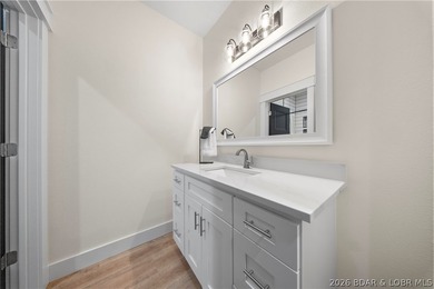 Experience luxury lakefront living in this fully furnished - photo 48