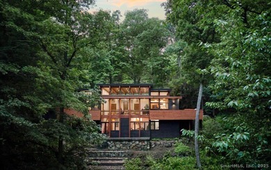 This exquisite Frank Lloyd Wright Usonian-inspired lakefront - photo 3