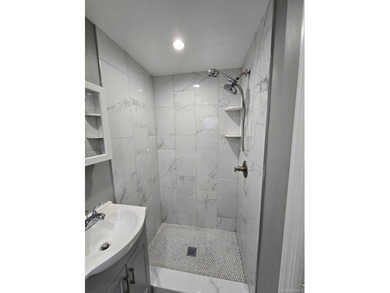 Centrally located two-family home offering a strong opportunity - photo 9