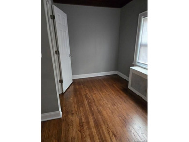 Centrally located two-family home offering a strong opportunity - photo 10