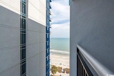 Experience unbeatable oceanfront living in this beautifully