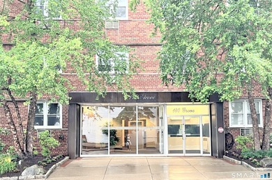 Downtown Living, Simplified & Smart: Turnkey Corner Condo at 140 - photo 1