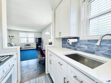 Downtown Living, Simplified & Smart: Turnkey Corner Condo at 140 - photo 8