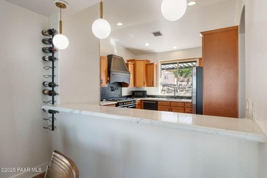 Luxury meets low-maintenance living in this exquisitely updated - photo 10