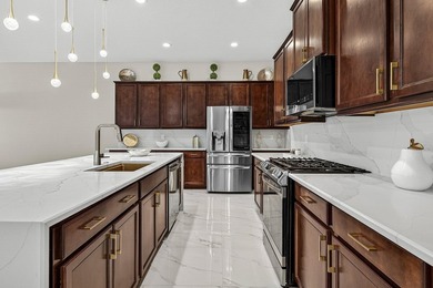 This beautifully updated 5-bedroom, 4-bath home offers the - photo 15