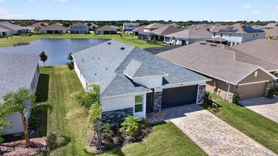Welcome to this stunning lakefront split plan home in The - photo 1
