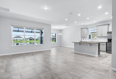 Welcome to this stunning lakefront split plan home in The - photo 3