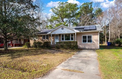 Welcome home to this well-cared-for brick beauty in the heart of - photo 1