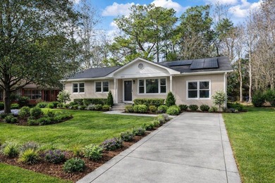 Welcome home to this well-cared-for brick beauty in the heart of - photo 4