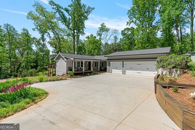 If you've been searching for a Lake Lanier lakefront home with a - photo 5