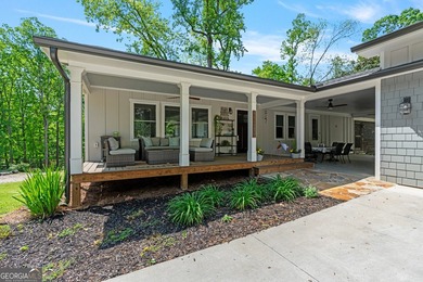 If you've been searching for a Lake Lanier lakefront home with a - photo 6