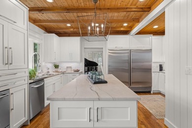 Experience luxury lakefront living in this custom-designed home - photo 22