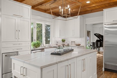 Experience luxury lakefront living in this custom-designed home - photo 23